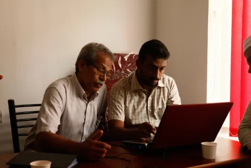 Dr. N.P. Hafiz Mohamad with Naseem Khan M, E-Beams Info Tech Director, valuing sociologists' viewpoints