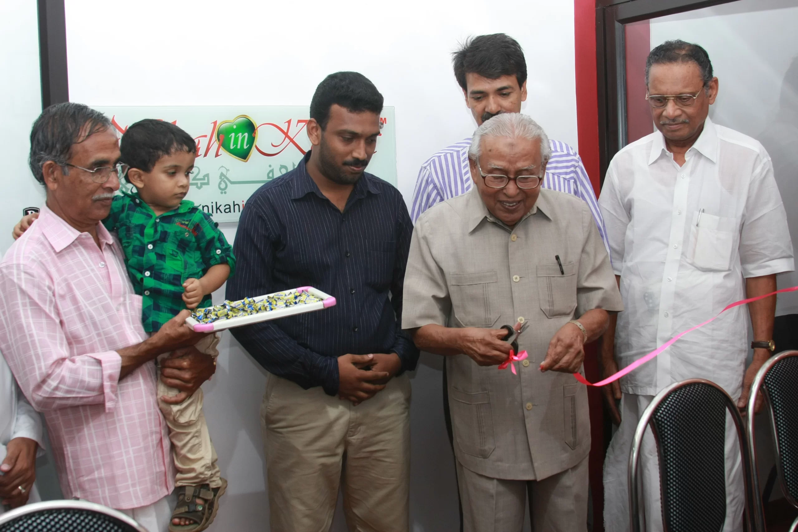 Inauguration of NikahinKerala Cochin Office by Justice P.K. Shamsudheen, Prof. P.K. Muhammed, Advocate Kunjumon, and Directors Naseem Khan M and Raseena MA at MES Cultural Complex, Kaloor, Ernakulam.